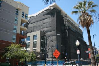 Building with tarp