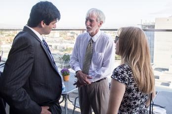 (Center) Center Commissioner Gary Bloch '81 speaking with Solo Practitioner (Lef