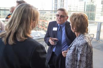 (Center) Dean Guernsey speaking with Solo Practitioner