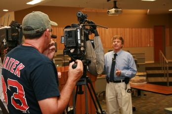 Professor Dennis Saccuzzo being interviewed by the press
