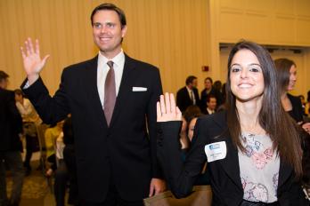 Kevin Bergt and Kelly Caputo being sworn in