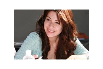 3L Tina Asturias works with a client